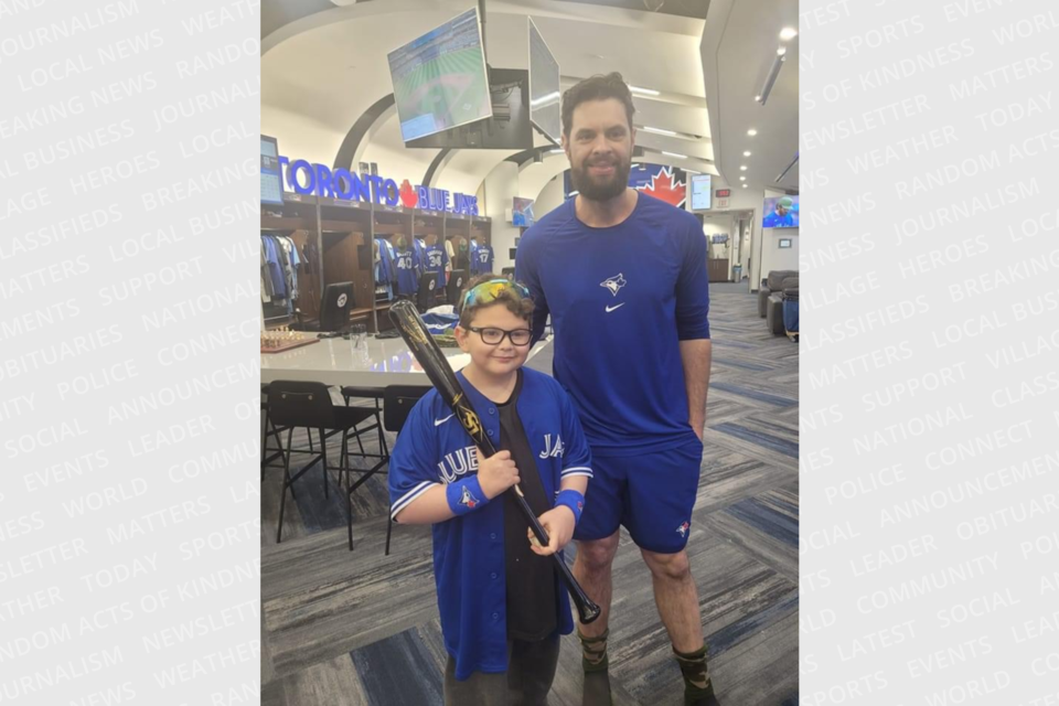 Cambridge's Joel Moscato received a tour of the Toronto Blue Jays clubhouse after last Saturday's game against the Baltimore Orioles and met first baseman Brandon Belt.