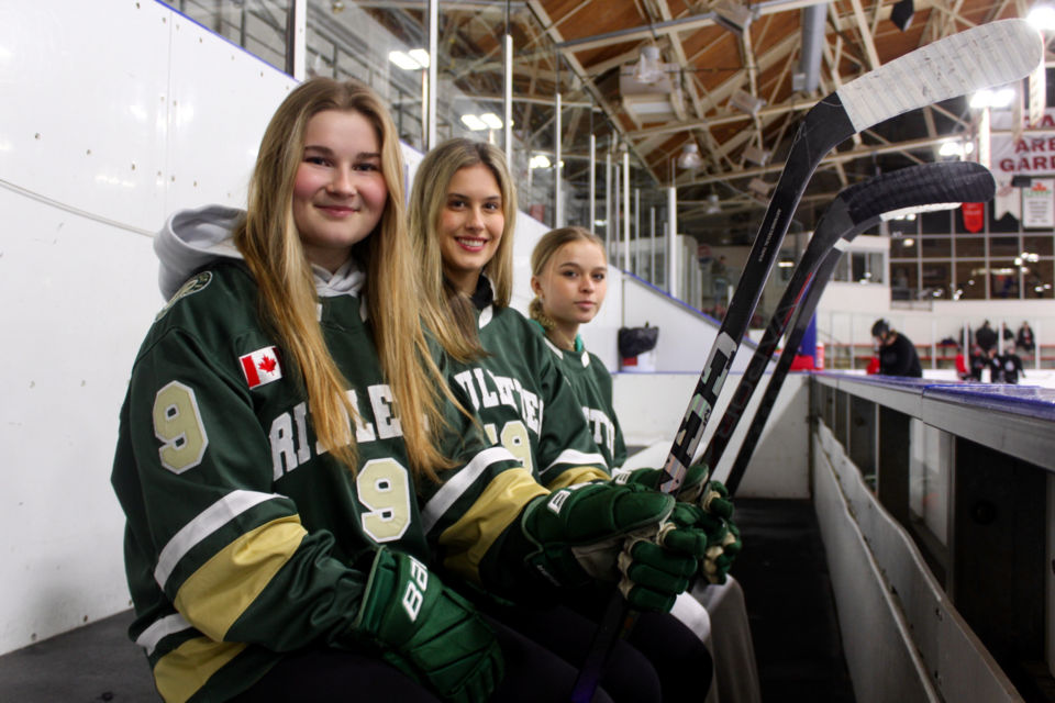 Mave O'Hagan (left), Lexi Cupolo and Reese Reid of the Cambridge Rivulettes have new dreams of a professional hockey career after the launch of the PWHL.