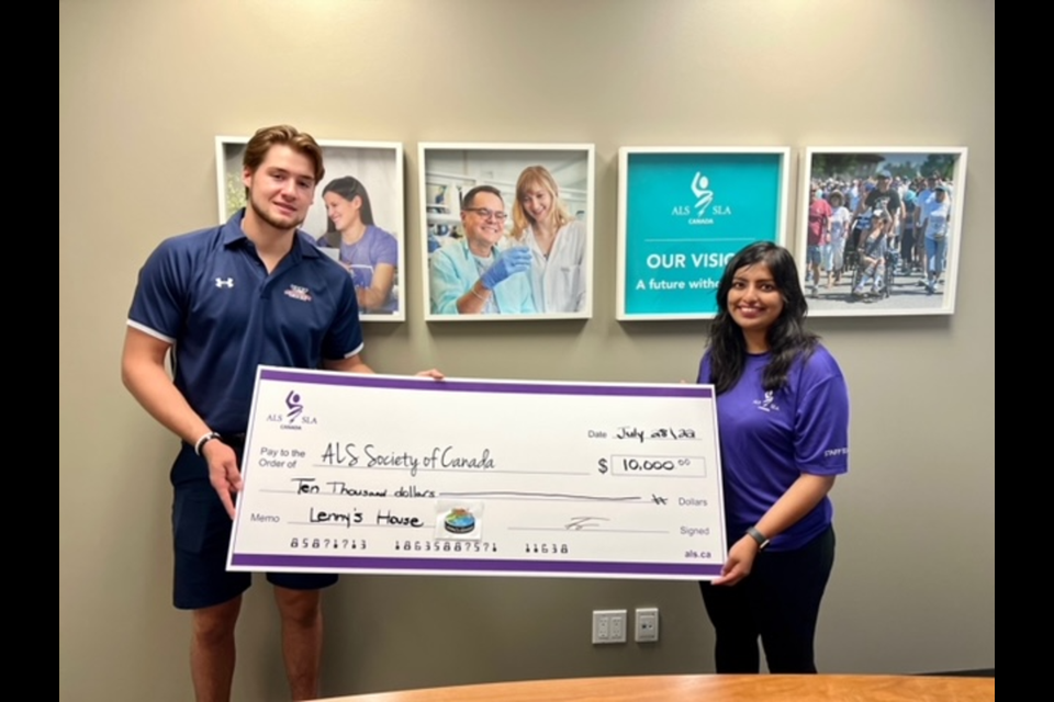 Tristan Lennox's presents a check for $10,000 to the ALS Society of Canada