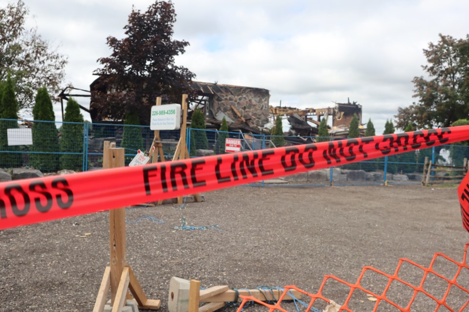 Fire tape surrounds the perimeter of the Old Marina Restaurant after the devastating fire 