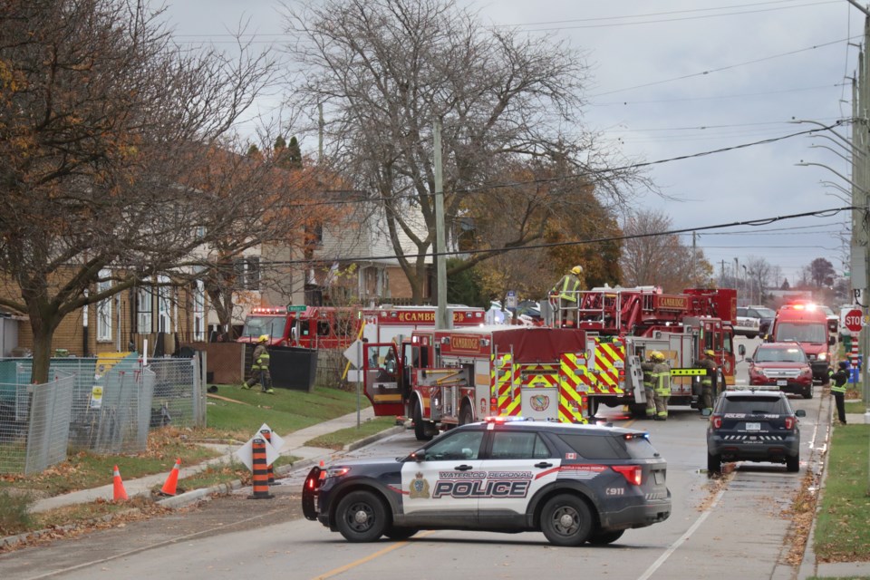 Police and firefighters shut down Langs Drive as fire crews battle an early morning blaze.