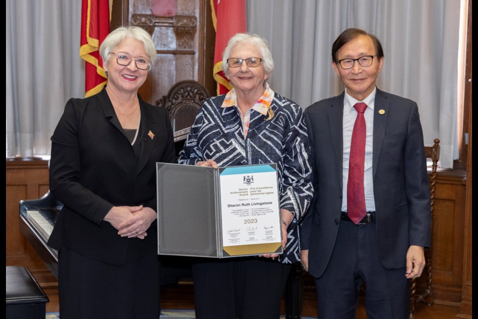 From left, Lieutenant Governor of Ontario Edith Dumont, Sharon Ruth Livingstone, and Minister of Seniors and Accessibility of Ontario Raymond Cho.