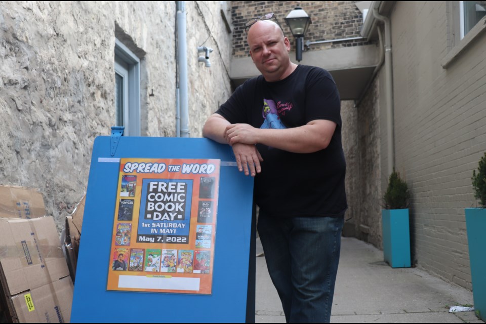 Chris Chettle stands outside his store, Retro Rocket Comics and Toys in downtown Galt.