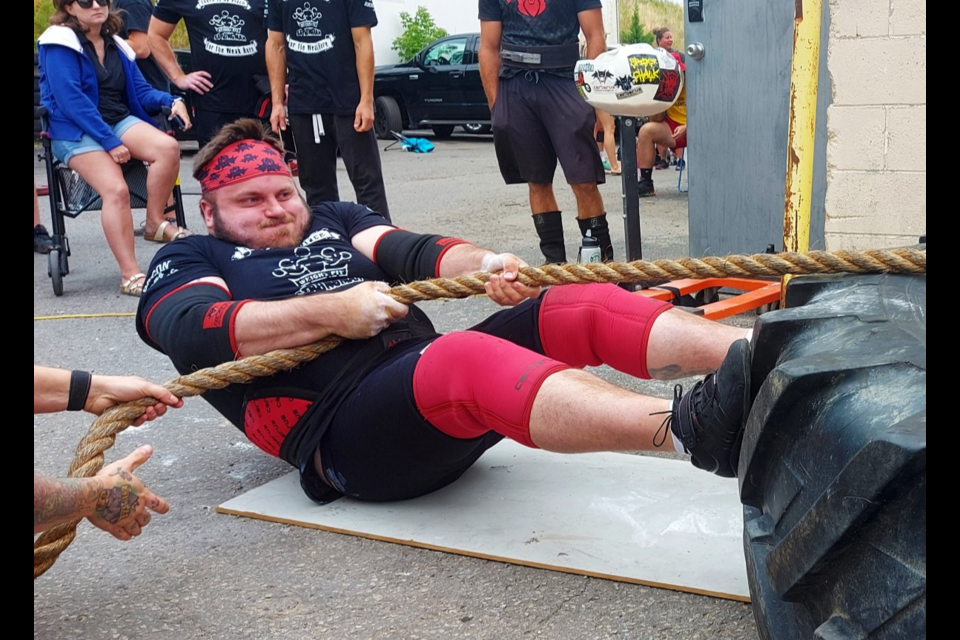 Hosted by a strength training gym in Cambridge, one of the events had competitors pull a vehicle over a pre-determined line.