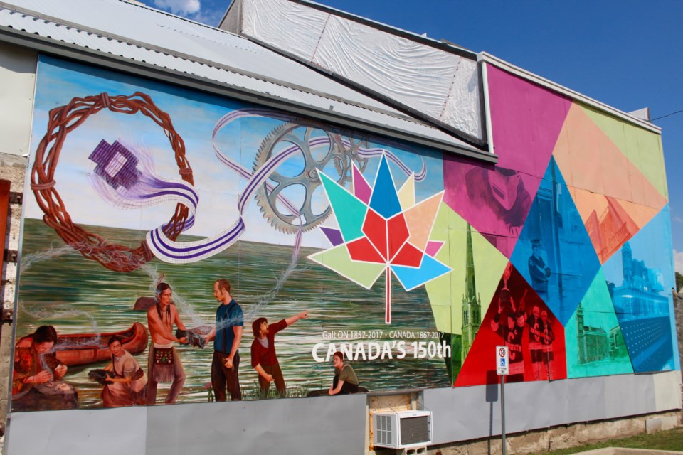 The walking tour visits numerous murals created over the years, including this one from the Canada 150 celebration in 2017.  Matt Betts/CambridgeToday