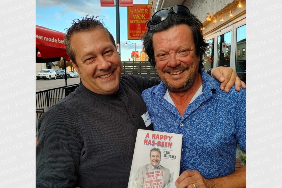 Bill Welychka with Paul Langlois, from the Tragically Hip, who wrote the forward for the book.
