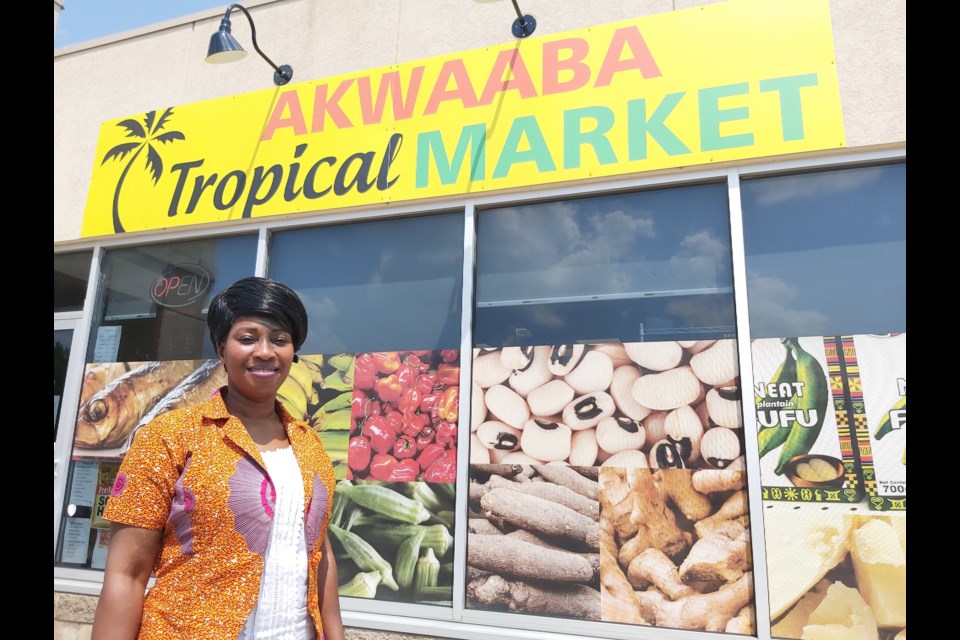 Gina Owusu, co-owner of the Awkwaaba Tropical Market on Langs Drive in Cambridge, is delighted by the response so far.