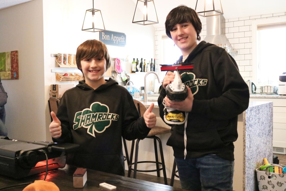 Nathan Kitzman, left, and his younger brother Ryan own a new skate sharpening business called Shamrock Sharpening.