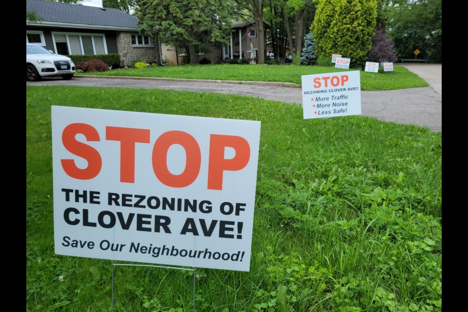 Residents on Clover Avenue are opposed to a rezoning application for 15 Clover Ave. that would allow 30 stacked townhomes to be built on the site.