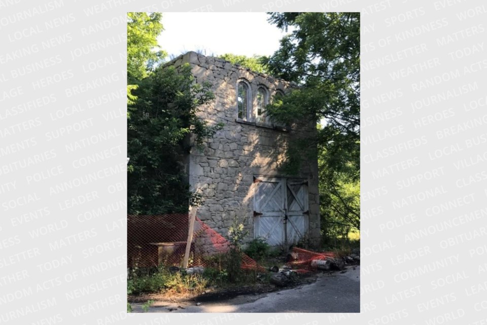 City staff is recommending this stone tower on the Forbes Estate property be moved to Jacob's Landing park.