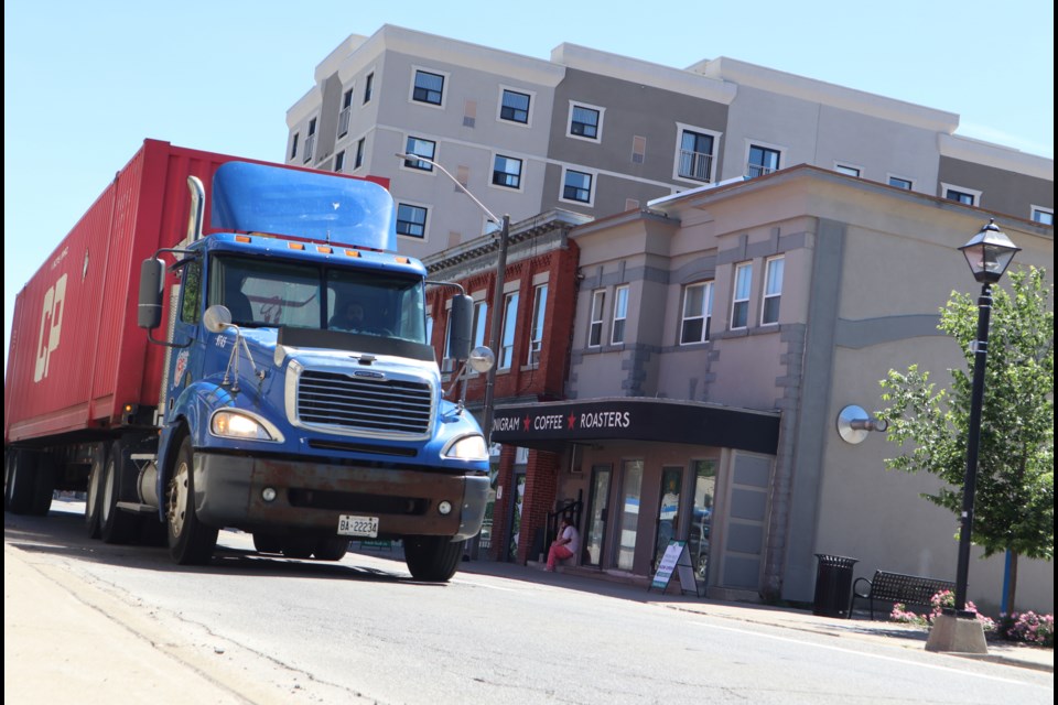 A truck travels down Ainslie Street in the heart of Galt's core.