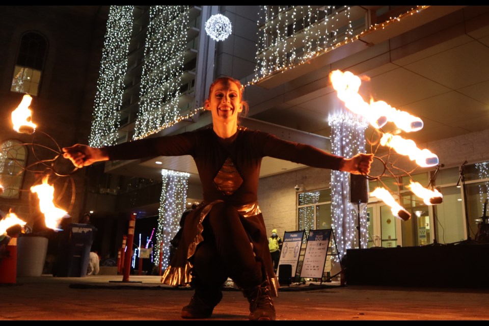 The city's Winter Illumination lights festival kicked off at Civic Square, featuring performances and food trucks in each of the cores Wednesday night, including fire dancers.