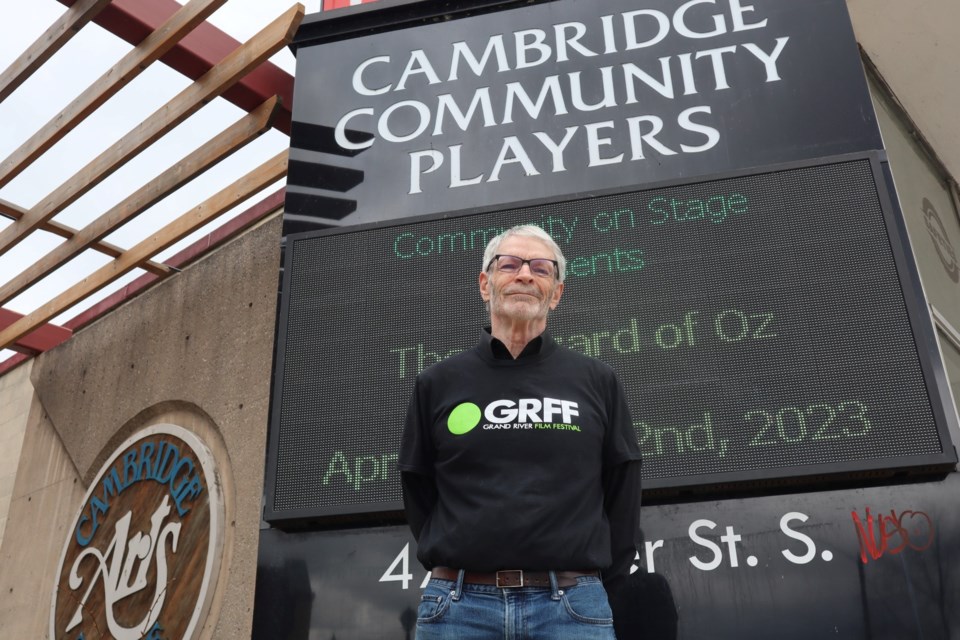 Paul Tortolo, programmer and former chair of the Grand River Film Festival, stands outside the Cambridge Arts Theatre, one of three venues showing festival films next month.