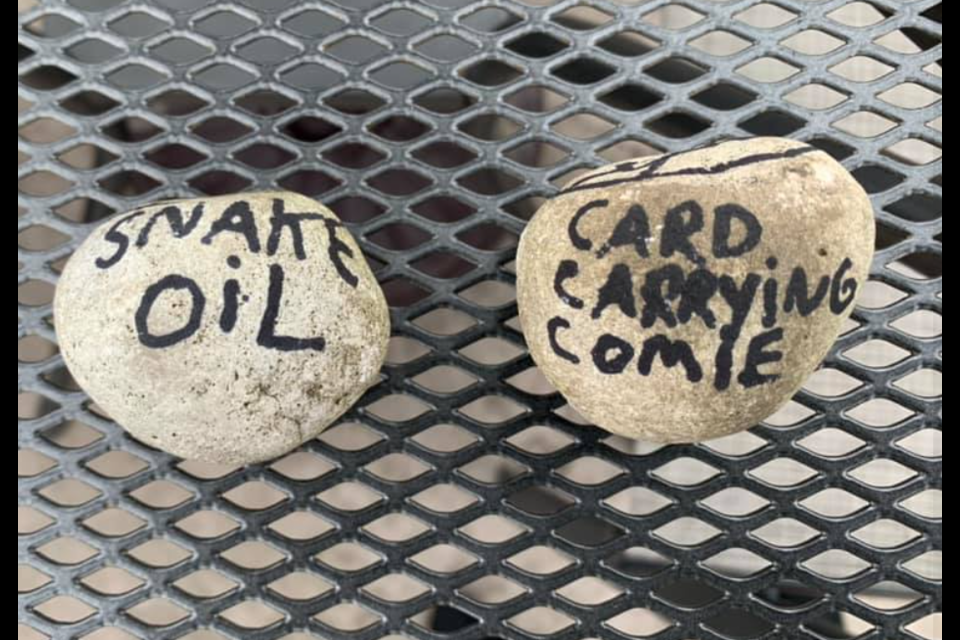 Zaz Bistro posted photos of the rocks tossed into their front window early Wednesday morning. Anti-vaccine images and messages are written on the rocks with permanent marker.