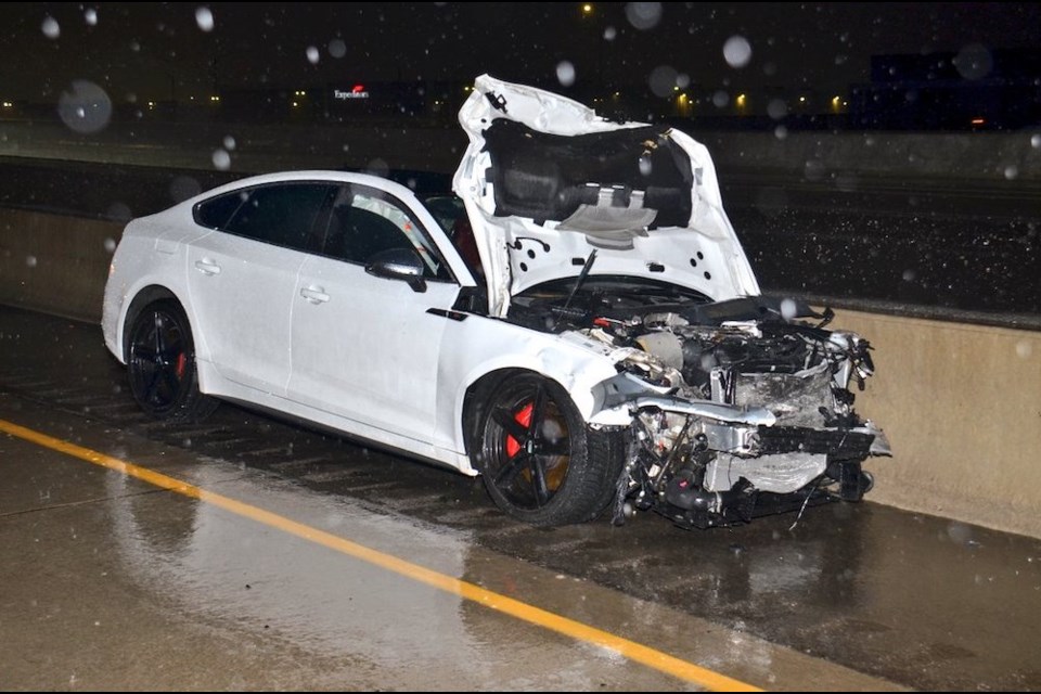 The driver of a white Audi S5 was seen fleeing scene of a fatal collision on Highway 401 at Mavis Road on the morning of April 22, 2023