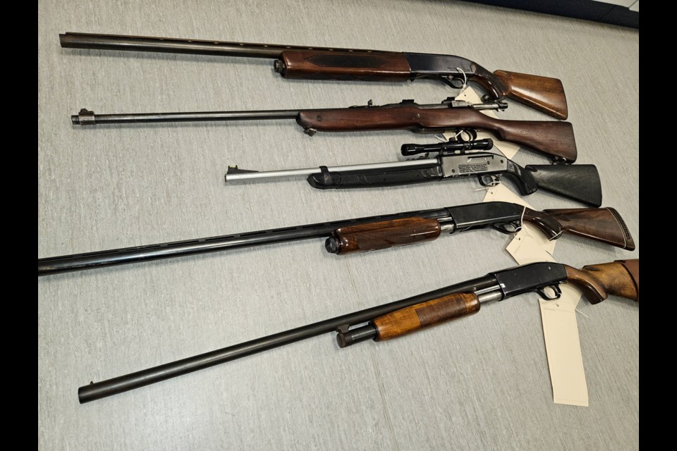 Weapons and drugs were seized from two homes in Waterloo and Kitchener this morning.