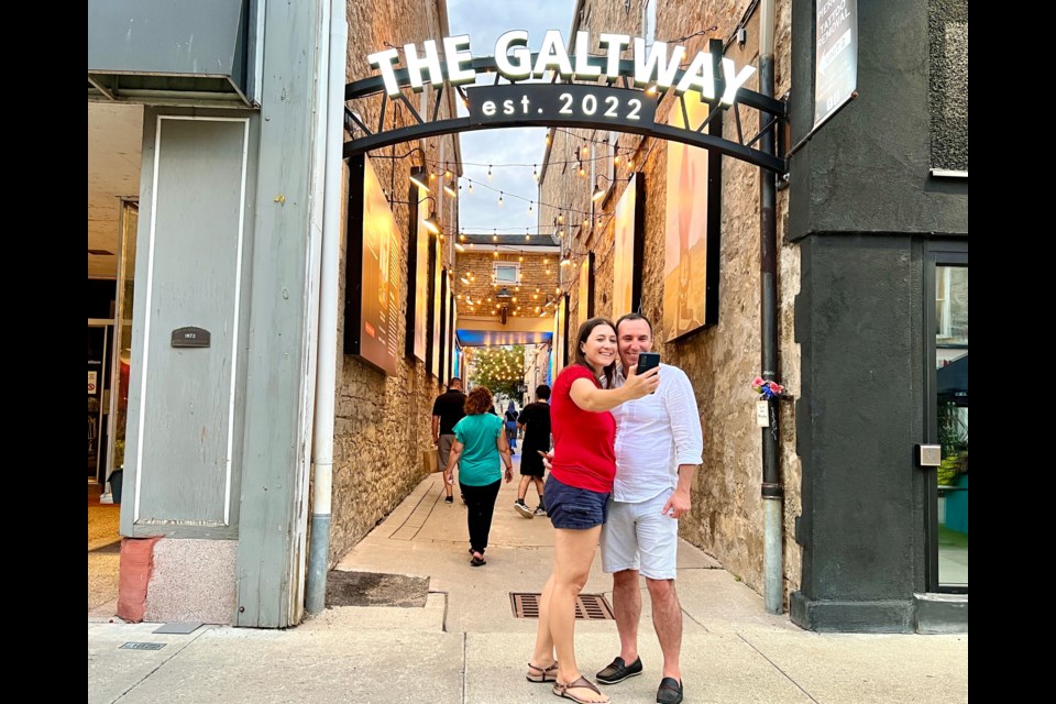 People pose in front of The Galtway during its grand opening.