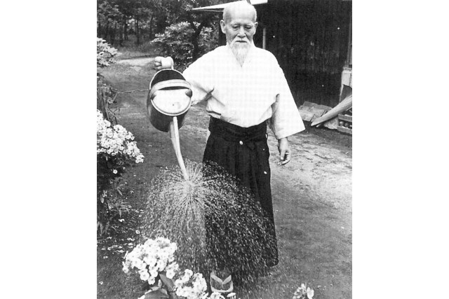 Ueshiba O Sensei watering the garden