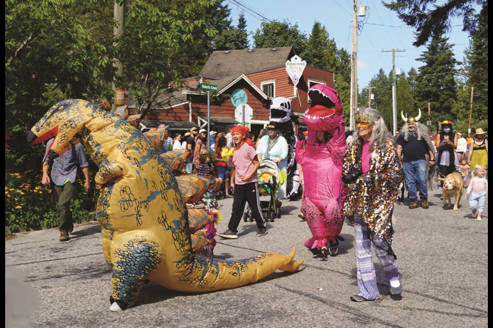 The annual Creek Daze public weekend gathering at Roberts Creek was limited to just Sunday, Aug. 22 this year, and it drew hundreds of people to the community’s “downtown” neighbourhood under sunny skies. Festivities are always kicked off with the ragtag Higgledy Piggledy Parade, which this year featured a few dinosaurs.