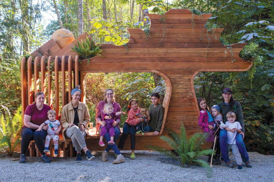 A.Art Beat - Cambria Logan (centre) with Wood Mural sculpture (credit Michael Gurney)