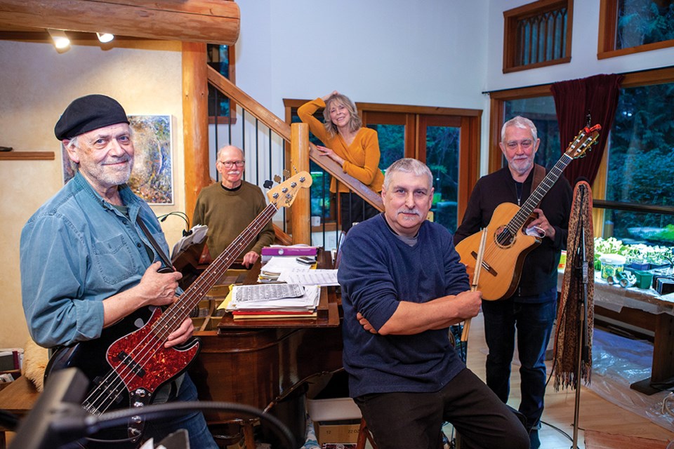 Boyd Norman (left), Ken Dalgleish, Wanda Nowicki, Tim Enns and Peter Hill rehearse the music of David King in preparation for the Foolish Man show on May 1.