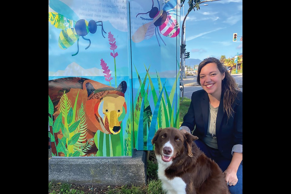 Lydia Avsec with dog Elsa at her art wrap project in Acacia Park.