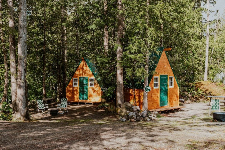 Four A-frame cabins are available to book individually or as a group.