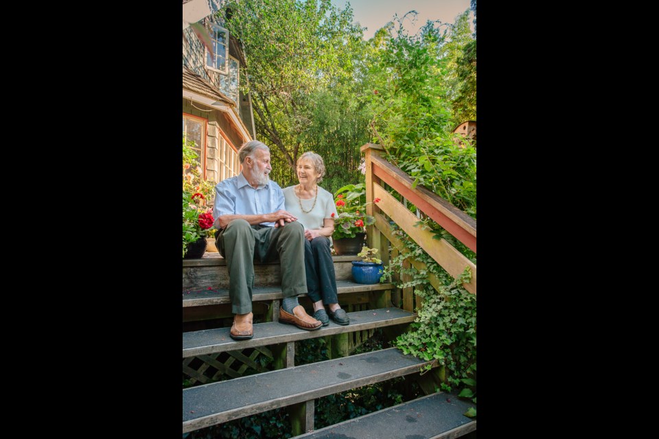 Andy and Olga Towert,
on their porch steps in Roberts
Creek overlooking the garden.