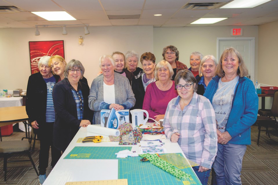 Members of the Pender Harbour Piecemakers gather for a quiltling retreat.