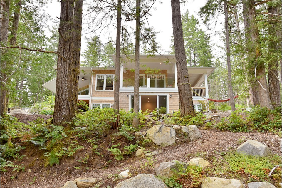 Nature surrounds this family home on the lake.