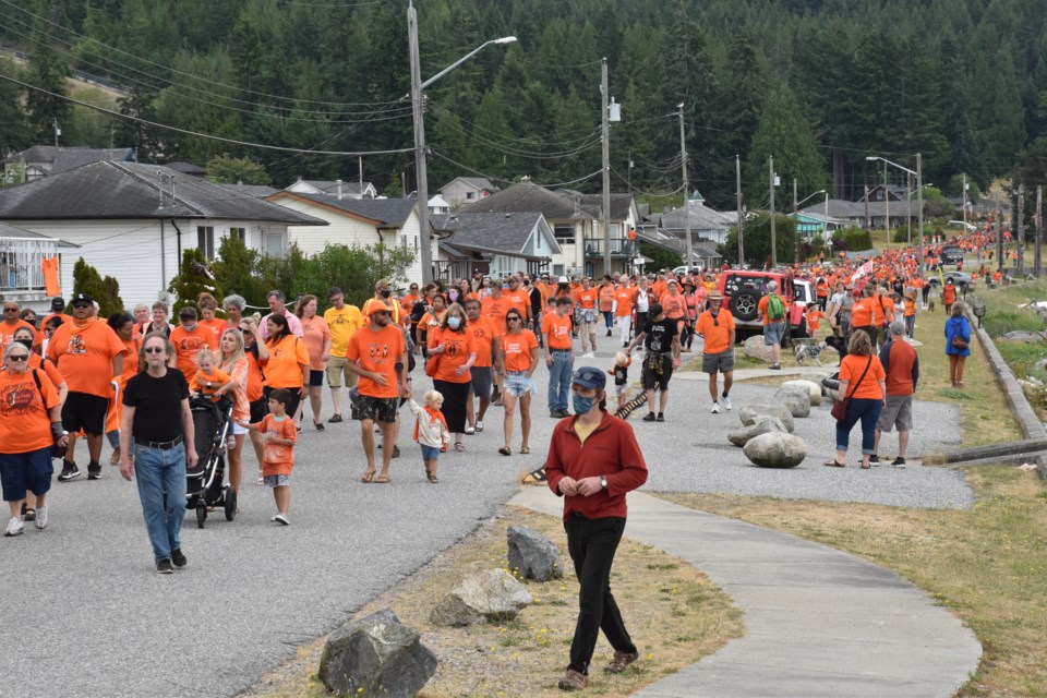 More than 1,000 people gathered on July 1 to join shíshálh Nation in a reconciliation walk.
