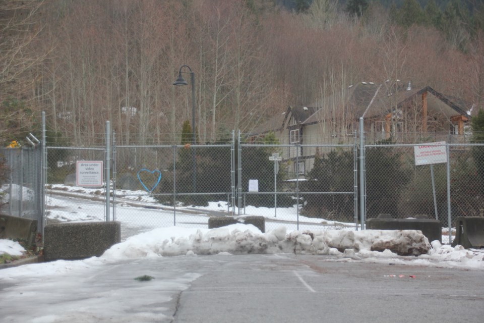 A state of local emergency extension request from Dec. 13, 2021, was posted on the fence outside the Seawatch neighbourhood, as seen on Jan. 11, 2022.