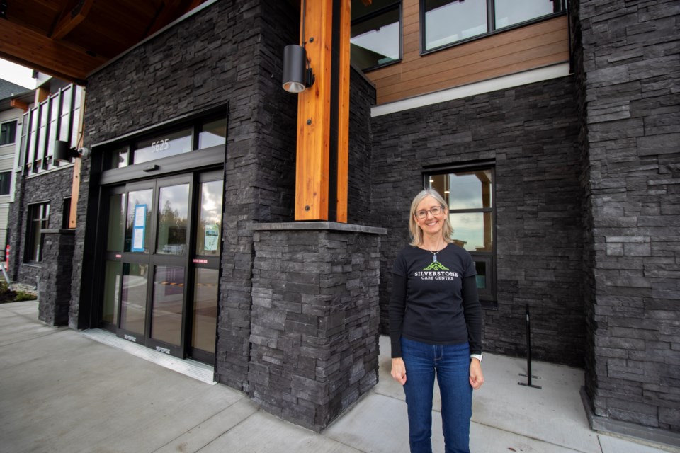 Mary McDougall, president of Trellis Seniors Services outside the new facility. 