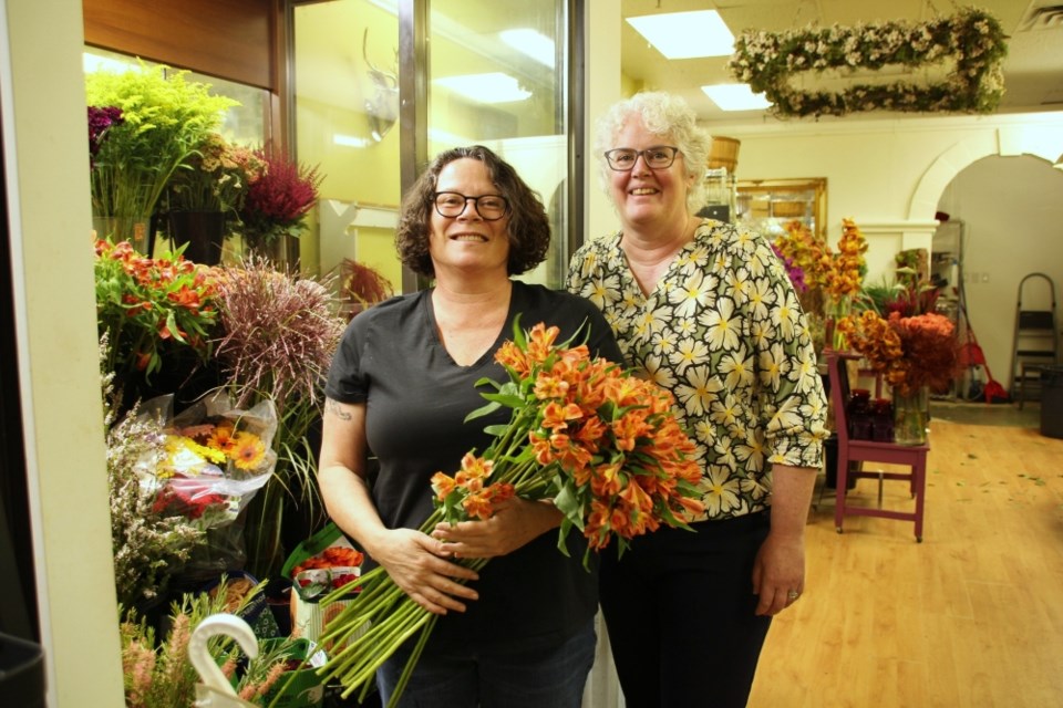 Laurel Marr and Wendy Martin bid farewell to their loyal customers. 