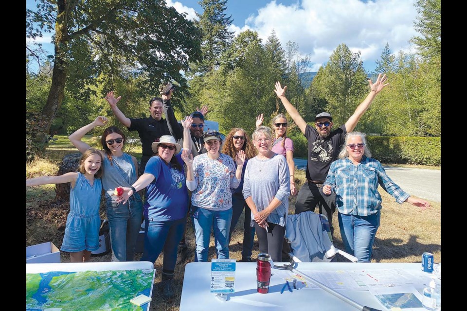 Some of the 50-odd volunteers who took on cleaning up the illegal dumping spots of the Elphinstone back roads at the Sunshine Coast Regional District’s Backroad Trash Bash last weekend. 
