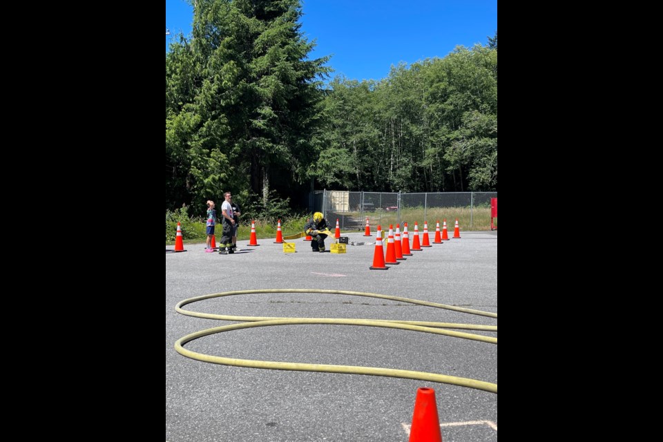 Halfmoon Bay firefighters took on their annual Tin Man Challenge in the scorching heat and bare pavement. 