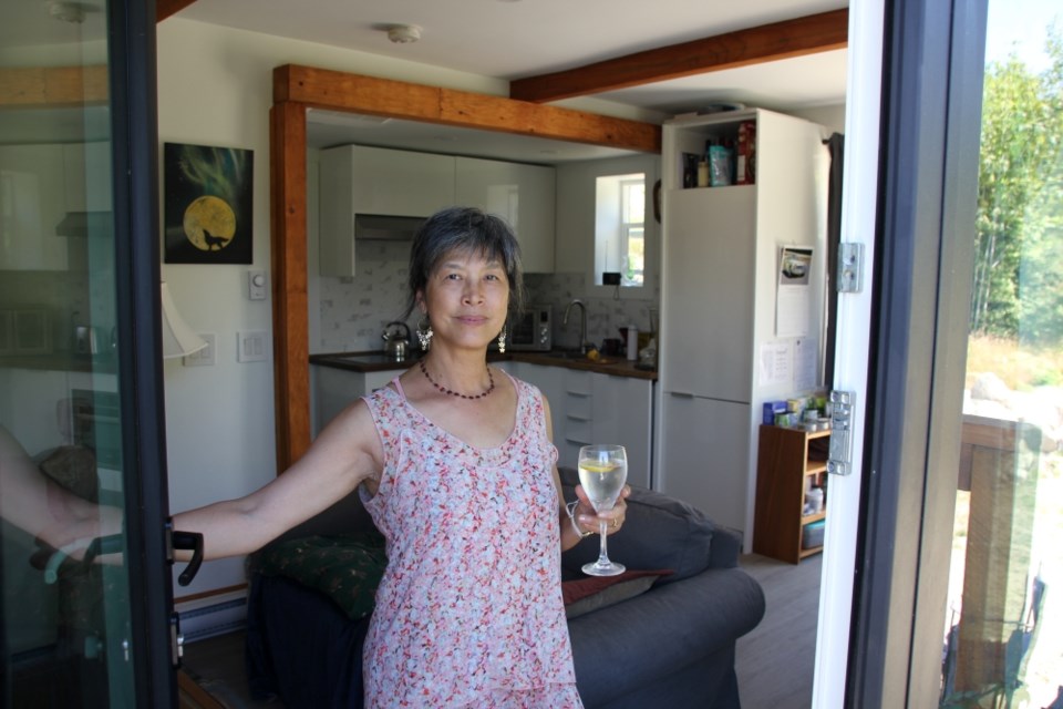 Wendy Henri feels at home in the first Rohe Homes model, placed in Sechelt.