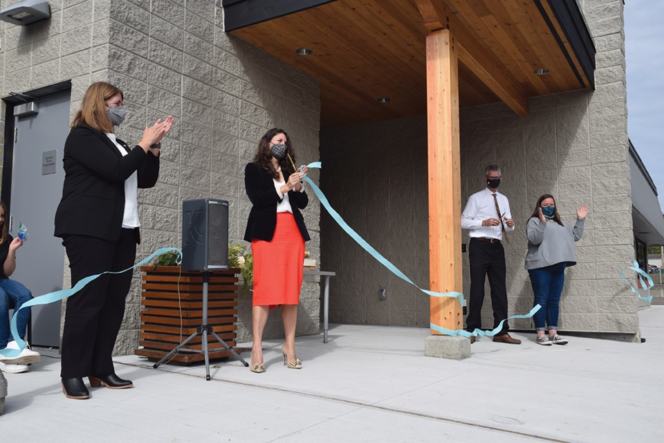 Superintendent Kate Kerr, school district board chair Amanda Amaral, West Sechelt Elementary principal Jeff Marshal and parent advisory council chair Aspen Wing cut the ribbon to officially open the new expansion on Sept. 21.