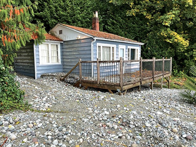 For the second time in 20 months, the cabin at 2016 Ocean Beach Esplanade was buried by debris from Whittaker Creek on Oct. 16.