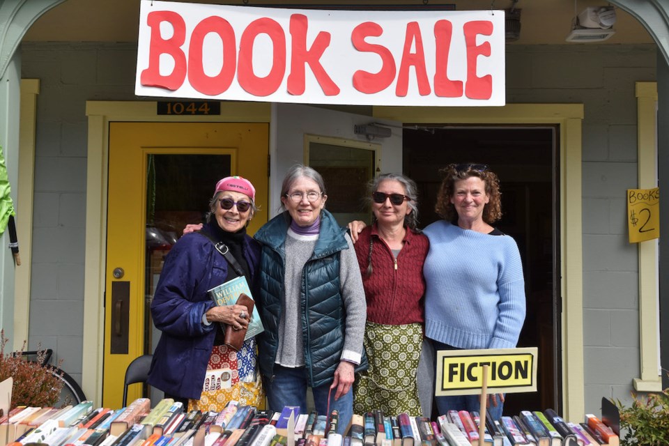 Eugehin Stephenson, Margaret DeWitt, Mariko Kiyooka and Janet Perry run the book sale at the Roberts Creek Library. 