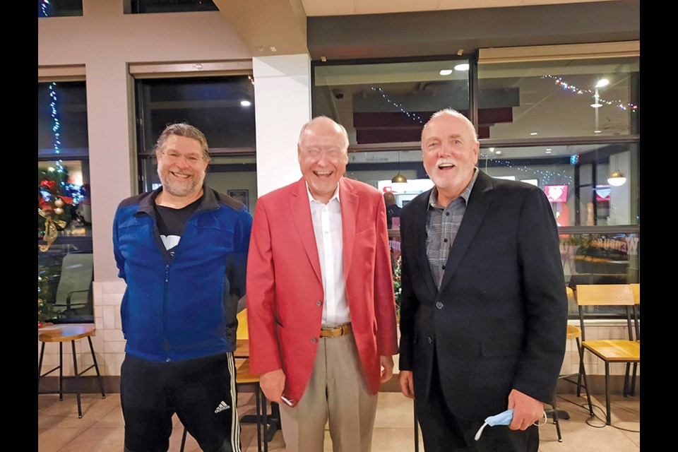 SCYSA President Jay Richlin (L), Wendy’s/Tim Horton’s owner Klaus Fuerniss and Gibsons Mayor Bill Beamish are all smiles as they announce that this year’s Festival of Lights raised a record-breaking $16,000 for the youth soccer association.