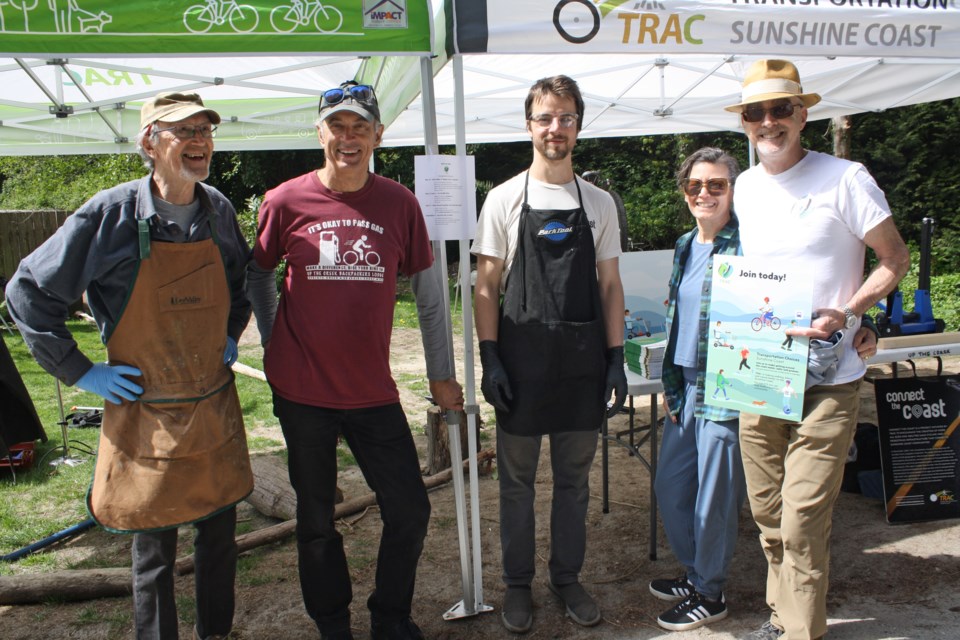 The crew from Transportation Choices Sunshine Coast (TraC) offered free bike repairs and tune-ups. From left: Ron Skene, Martin Prestage, Cedric Eveleigh, Paula Lee, and Stephen Forgacs.