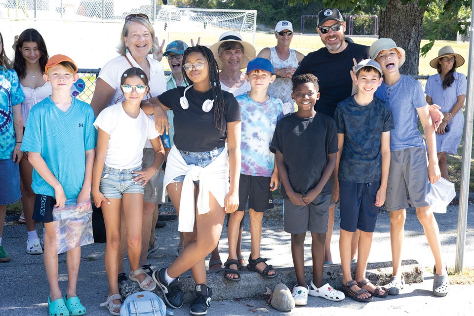 Seth, Nora, Petty, Nathan, Sedi, Owen and Joel (front row) and Anita, Dorothy and Jamie saunter to the Higgeldy Piggeldy parade each year.