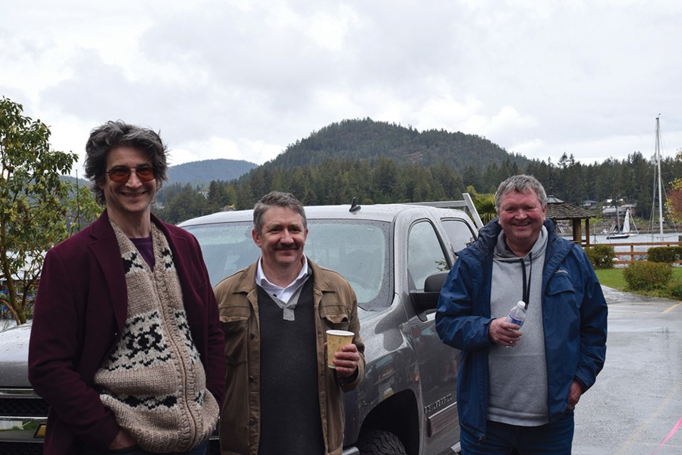 Scott Scobbie, MLA Nicholas SImons and SCRD Area A Director Lenoard Lee were on hand as the boat building got under way.