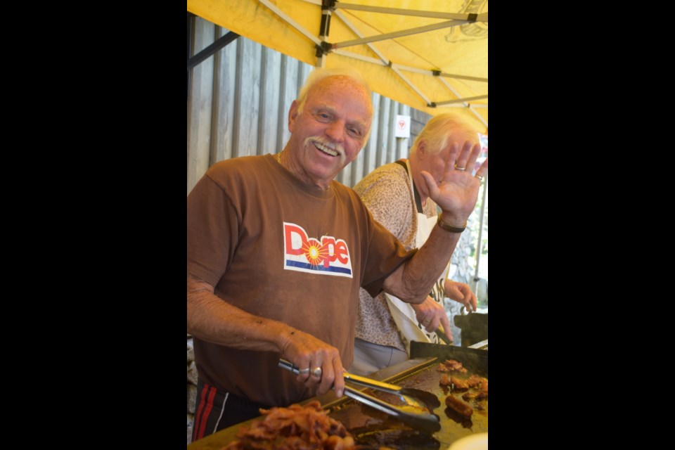 Volunteer Rick serving up the goods at the event pancake breakfast.