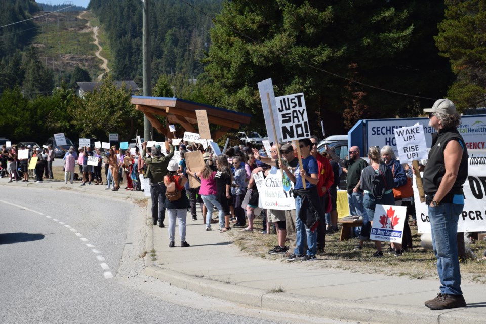 More than 220 people gathered to protest outside Sechelt Hospital on Sept. 1, calling for the freedom of choice and against mandatory vaccines, vaccine passports and segregation. 