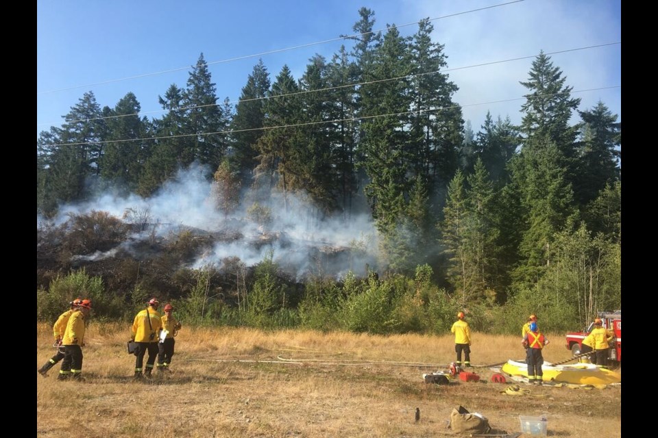 Two homes were evacuated because of a fire near Trout Lake Road.