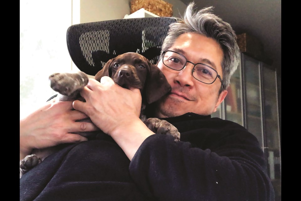 SUBMITTED PHOTO
ZOOM publisher Edmund Arceo with his dog, Scout. 