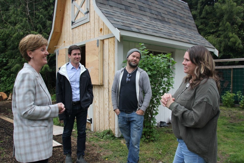 Minister of Agriculture and Agri-Food Marie-Claude Bibeau and MP Patrick Weiler on a tour of One Tiny Farm in Roberts Creek with Chris Hergesheimer and Cassandra Fletcher.  