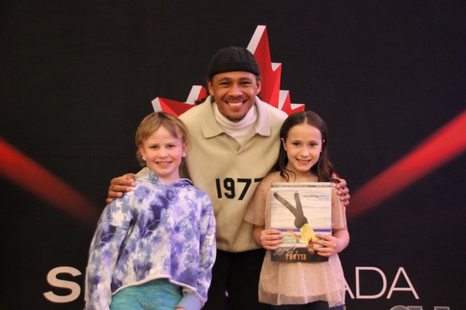 Charlotte Gruber and Jordyn McKinnon were excited to ask Elladj Baldé to autograph their programs for the upcoming showcase.